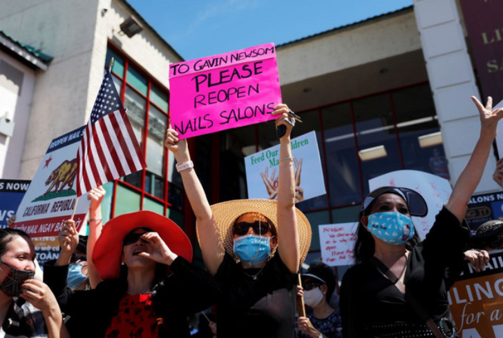Nail salons sue over job law