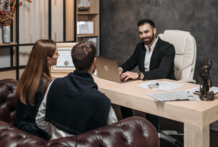 Couple discussing divorce with lawyer