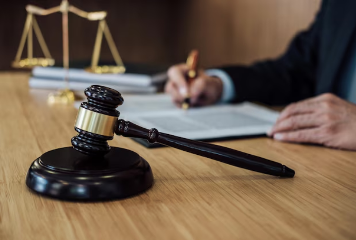 Courtroom documents and gavel