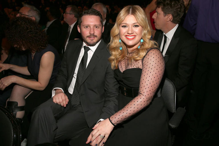Brandon Blackstock and Kelly Clarkson at an event.